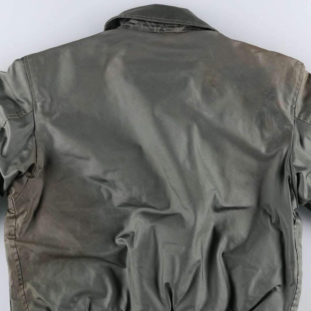 1980'S US Military Issue, Padded CWU 45 Jacket with Badge Aromatic polyamide Khaki type sage green Vintage Second Hand