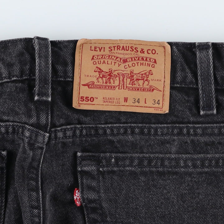 90'S Levi's 550-0260 Black Denim Tapered Denim Pants, Made in the USA, Men's Size 34, Vintage cotton black type Vintage Second Hand