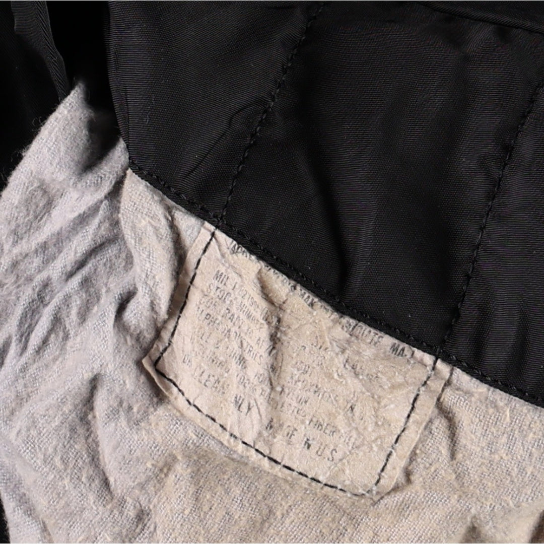 Civilian-made 1990'S MA-1 type padded military flight jacket, made in the USA, men's size L equivalent. Nylon black type Vintage Second Hand