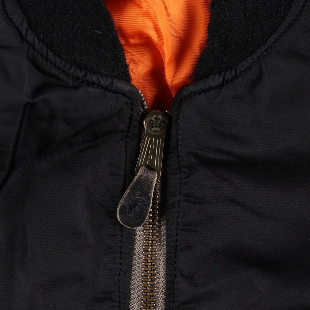 Civilian-made 1990'S MA-1 type padded military flight jacket, made in the USA, men's size L equivalent. Nylon black type Vintage Second Hand