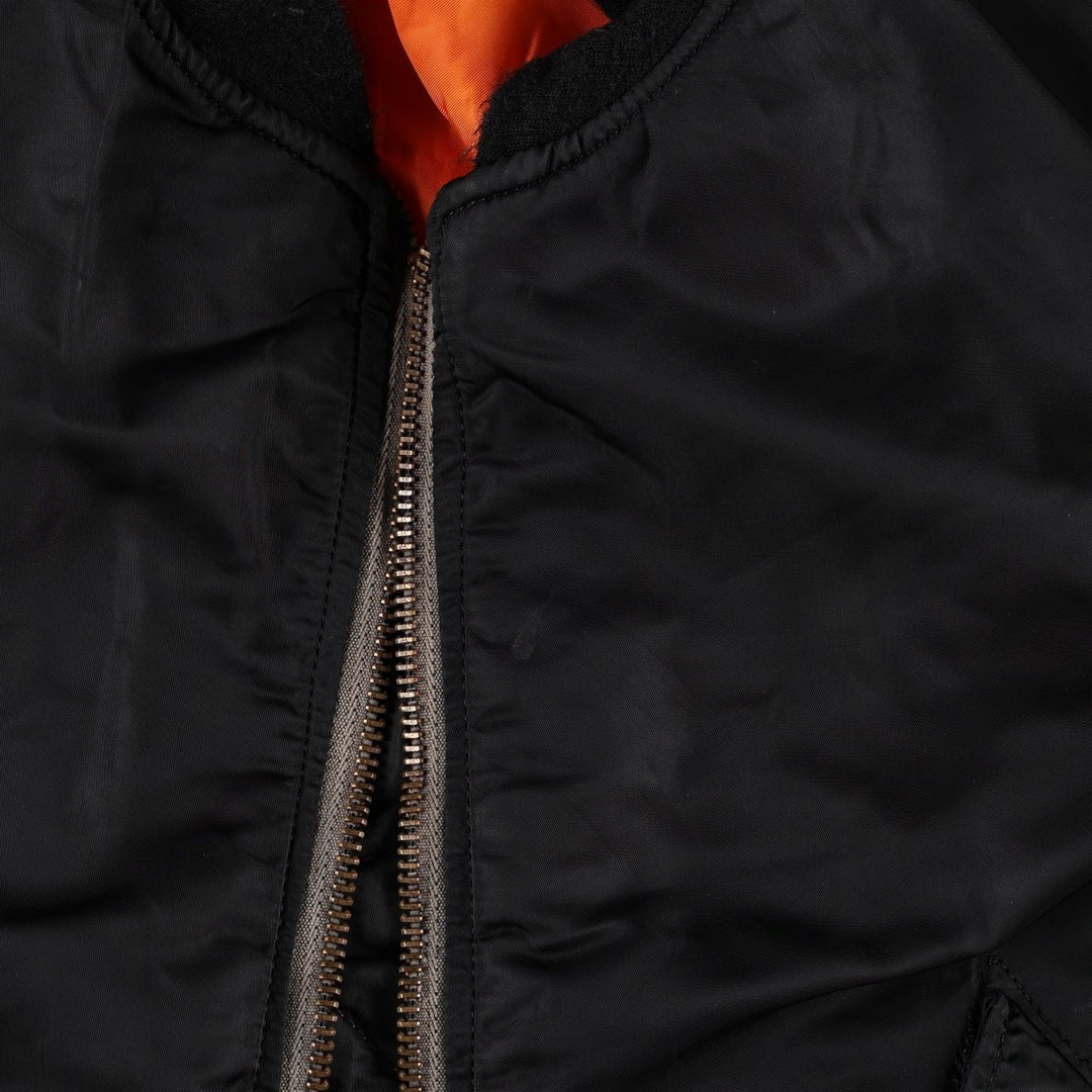 Civilian-made 1990'S MA-1 type padded military flight jacket, made in the USA, men's size L equivalent. Nylon black type Vintage Second Hand