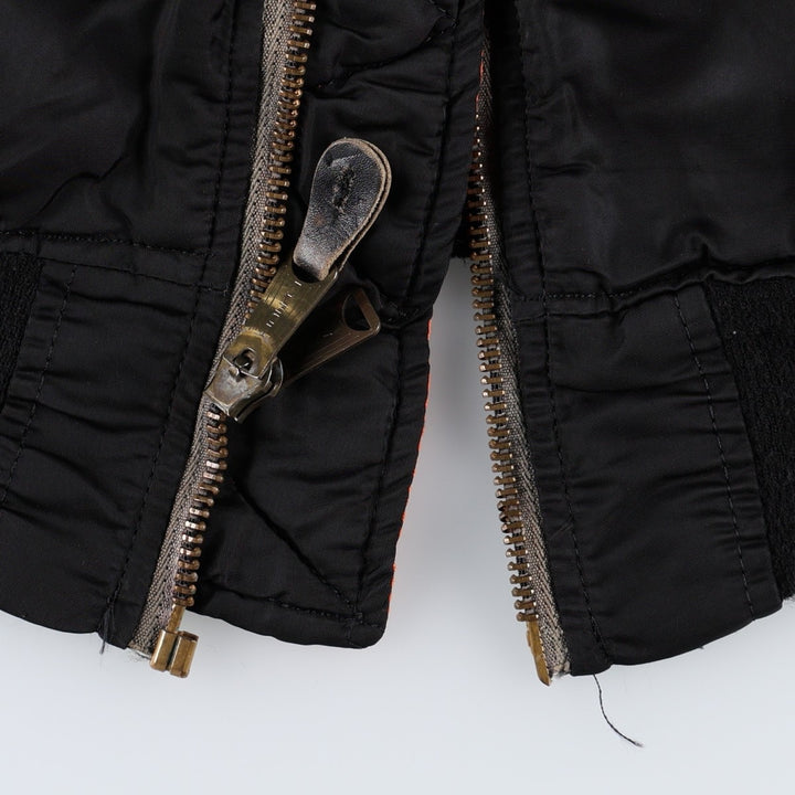 Civilian-made 1990'S MA-1 type padded military flight jacket, made in the USA, men's size L equivalent. Nylon black type Vintage Second Hand