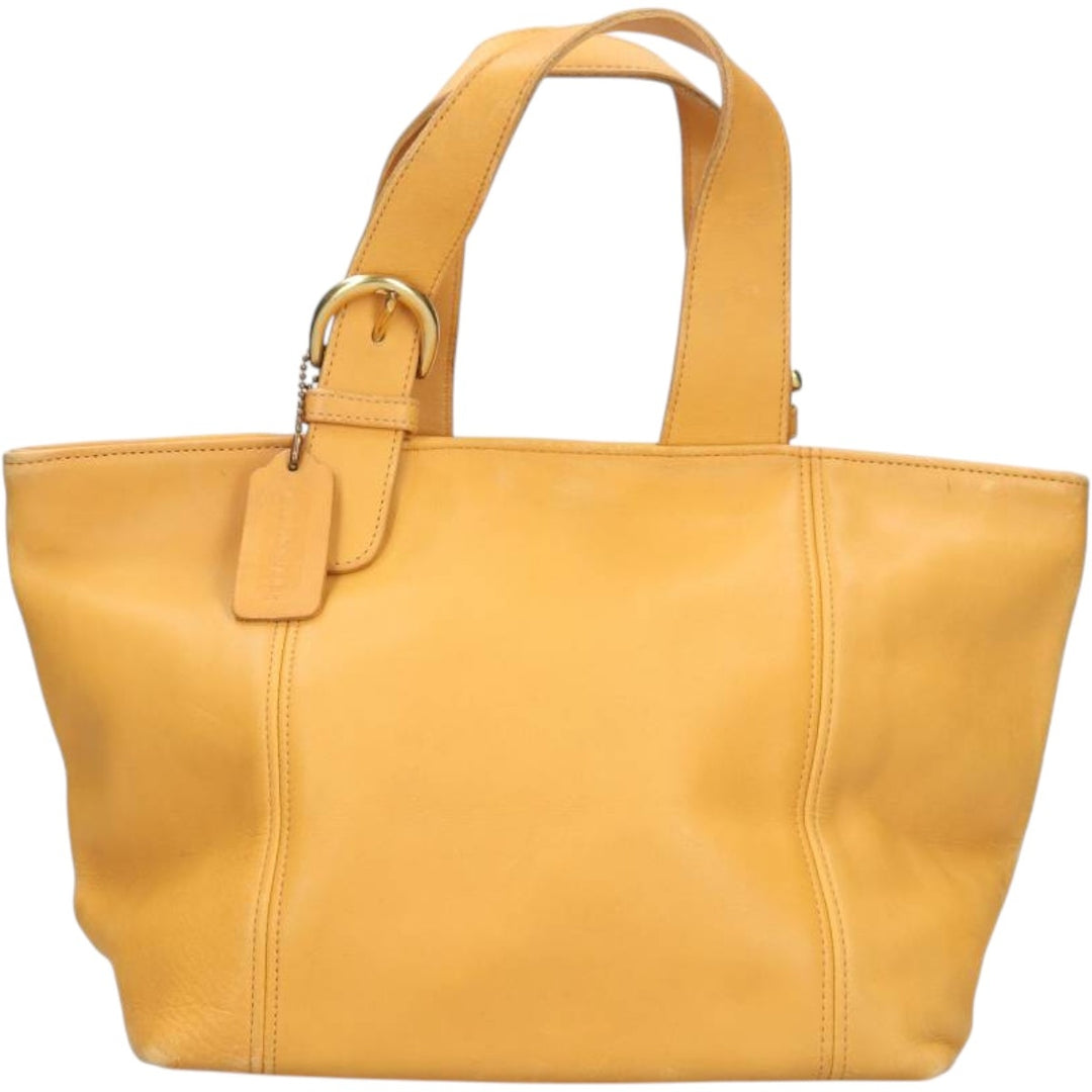 Vintage 1980'S Coach Old Coach handbag, made in the USA. genuine leather yellow type Vintage Second Hand