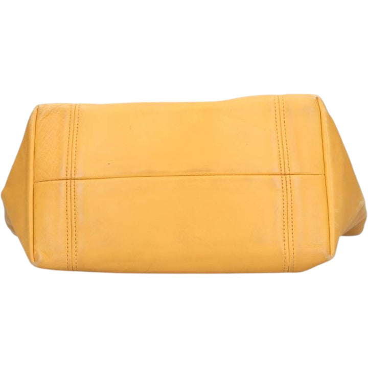 Vintage 1980'S Coach Old Coach handbag, made in the USA. genuine leather yellow type Vintage Second Hand