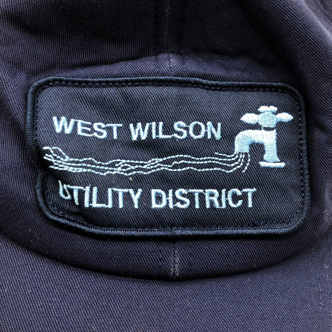 WEST WILSON UTILITY DISTRICT Advertising Baseball Cap, Made in USA, One Size Fits All unclear navy blue type Vintage Second Hand