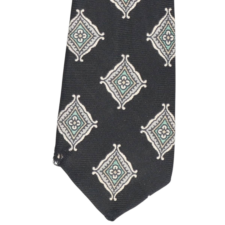 Tie Rack by Leonardo Strelli, featuring a diamond pattern and floral design, made in Italy. silk black type Vintage Second Hand